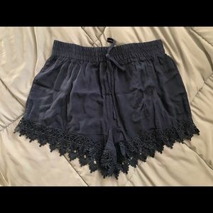 Navy lace-trimmed shorts